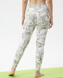 Back view of a woman performing a standing pose in BELVYNN Signature Asian Fit Leggings, highlighting the 40% Spandex compression and zero-slip waistband.