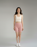 Front view of BELVYNN Women’s Performance Shorts in Pink, showcasing the no-ride-up fit and high-compression athletic silhouette.