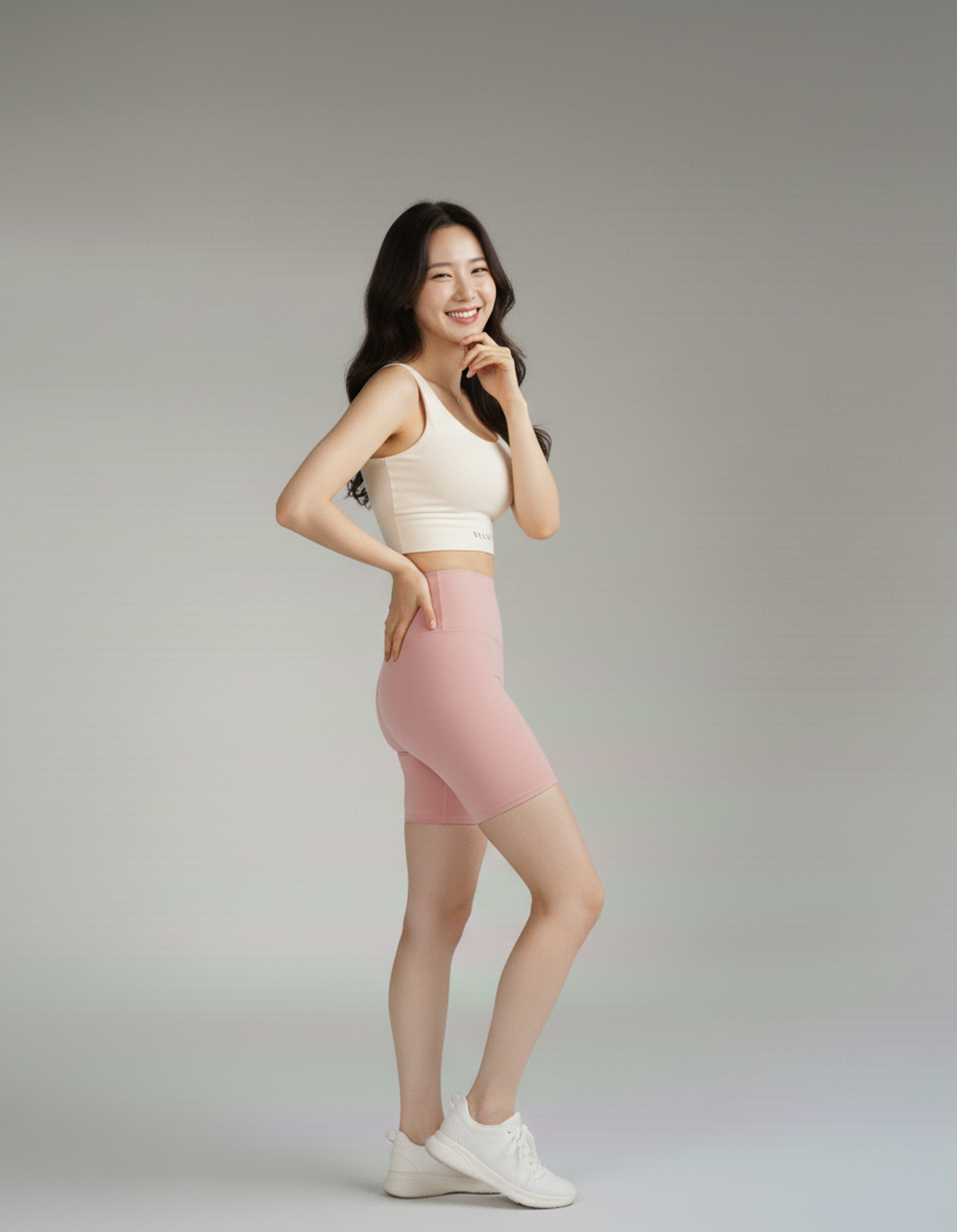 Side view of BELVYNN Women’s Performance Pink Shorts, showcasing the no-ride-up fit and high-compression athletic silhouette.