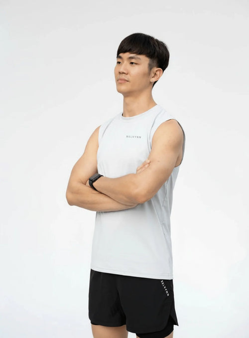 Side view of the BELVYNN Men’s Essential Tank Top in gray, showing the breathable fabric and athletic cut for high-intensity training.
