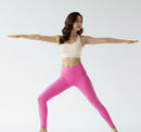 Yoga pose view of BELVYNN Women’s Long-Inseam Leggings in pink, featuring high-rise support and premium 40% Spandex stability.
